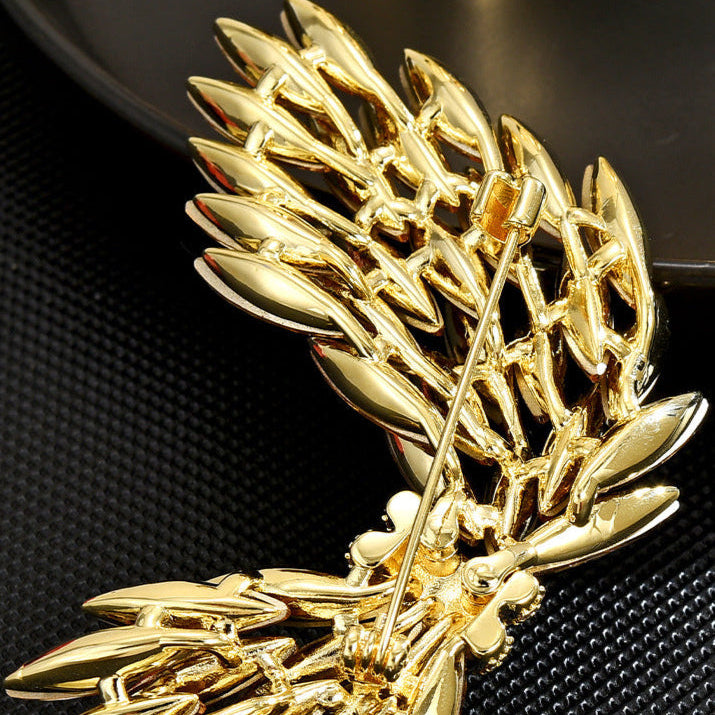 Diamond-Encrusted Angel Wing Brooch