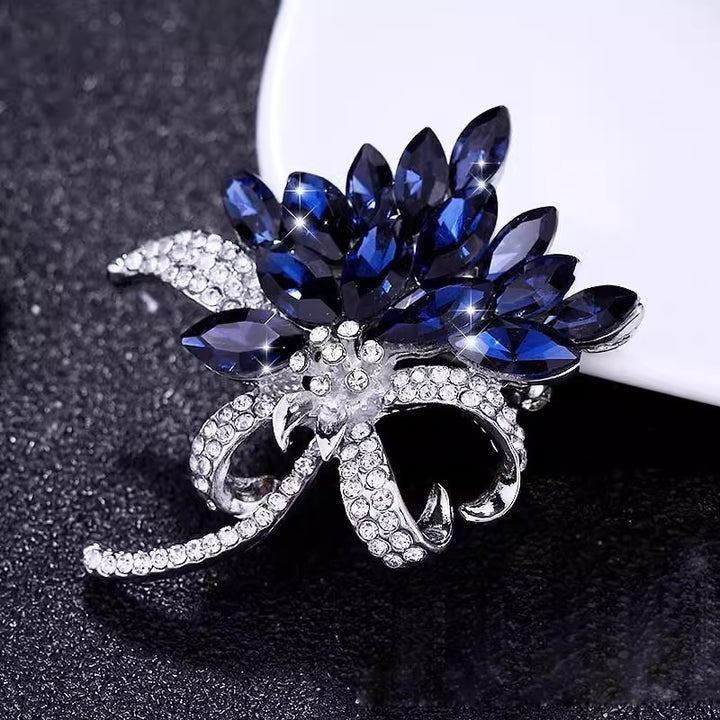 Diamond-Encrusted Blue Flower Brooch