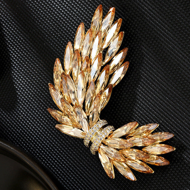 Diamond-Encrusted Angel Wing Brooch